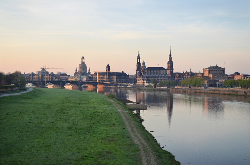 15 - The historic skyline of Dresden, Germany, featuring the famous River Elbe in the foreground and iconic Baroque landmarks along the bank